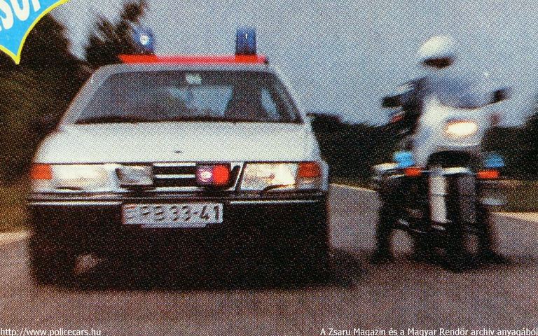 Saab 9000, A [url=http://www.zsaru.hu]Zsaru Magazin[/url], illetve elõdje, a Magyar Rendõr archív fotója
Keywords: rendőr rendőrautó rendőrség